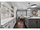 Bright kitchen features white countertops, custom backsplash, and stainless steel appliances at 300 Tarragon Dr, Fayetteville, GA 30215