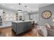 Kitchen with white cabinets, large island, stainless steel appliances, and dining room at 300 Tarragon Dr, Fayetteville, GA 30215
