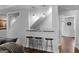 Living room with a grey sectional and bar seating at 300 Tarragon Dr, Fayetteville, GA 30215