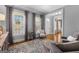 Comfortable living room features hardwood floors, neutral decor and an open view to the home's entryway at 300 Tarragon Dr, Fayetteville, GA 30215