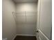 Walk-in closet featuring a wire shelf for easy storage and organization at 1102 Campbell Rd # 01, Covington, GA 30014