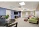 This finished basement includes carpet, recessed lights, neutral walls, and is fully furnished at 140 Rockglen Ct, Fayetteville, GA 30215
