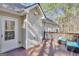 Cozy deck with patio seating, overlooking the backyard, ideal for relaxing and enjoying the outdoors at 140 Rockglen Ct, Fayetteville, GA 30215