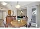 Cozy dining area with an open view of the living room at 140 Rockglen Ct, Fayetteville, GA 30215