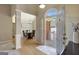 Grand foyer with hardwood floors and an open view of the dining room at 140 Rockglen Ct, Fayetteville, GA 30215