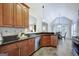 Spacious kitchen showcasing stainless steel appliances and dark granite countertops at 140 Rockglen Ct, Fayetteville, GA 30215