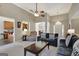 Open living space with fireplace, plush seating, and an open floor plan at 140 Rockglen Ct, Fayetteville, GA 30215