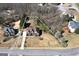 Expansive lot showcasing a well-maintained home with a spacious yard surrounded by mature trees at 149 Crown Glen Way, Stockbridge, GA 30281