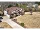 Aerial view of the home showcasing the manicured lawn and long driveway at 149 Crown Glen Way, Stockbridge, GA 30281