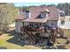 Expansive two-story deck with stairs, ideal for outdoor entertaining and relaxing in a private setting at 149 Crown Glen Way, Stockbridge, GA 30281