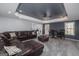 A large basement featuring gray carpet, a large sofa, and a game table and chairs at 149 Crown Glen Way, Stockbridge, GA 30281