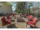 Backyard fire pit area with comfortable seating, perfect for cozy outdoor gatherings at 149 Crown Glen Way, Stockbridge, GA 30281