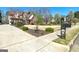 Spacious front yard with a concrete driveway and meticulous landscaping at 149 Crown Glen Way, Stockbridge, GA 30281