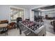 Spacious recreation room featuring a foosball table and additional seating area at 149 Crown Glen Way, Stockbridge, GA 30281