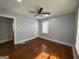 Bedroom with hardwood floors, ceiling fan, and natural light from a window at 1165 Fair Sw St, Atlanta, GA 30314
