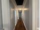 Long hallway featuring hardwood floors and neutral-colored walls at 1165 Fair Sw St, Atlanta, GA 30314