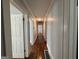 Long hallway featuring hardwood floors, neutral paint and recessed lighting at 1165 Fair Sw St, Atlanta, GA 30314