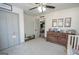 Bedroom featuring neutral carpet, double door closet and wood dresser at 120 Fountain Head, Peachtree City, GA 30269