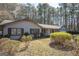 Charming home featuring mature landscaping, shutters, and a well-maintained lawn at 120 Fountain Head, Peachtree City, GA 30269