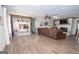 Spacious living room boasts wood floors, large windows, and a fireplace at 120 Fountain Head, Peachtree City, GA 30269