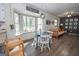 Open floor plan with bay window, breakfast table and wood-look flooring at 120 Fountain Head, Peachtree City, GA 30269