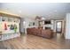 Spacious living room boasts wood floors, natural light, and a fireplace at 120 Fountain Head, Peachtree City, GA 30269