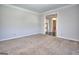 Bare bedroom with carpet, neutral colors and a doorway to the rest of the house at 2808 Autumn Lake Ln # D/6, Decatur, GA 30034