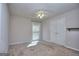Neutral bedroom with carpet, ceiling fan, double door closet and a sunlit window offering natural light at 2808 Autumn Lake Ln # D/6, Decatur, GA 30034