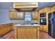 Kitchen featuring a range hood, wood cabinetry, and stainless steel appliances at 2808 Autumn Lake Ln # D/6, Decatur, GA 30034