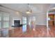Bright living room showcasing a fireplace, vaulted ceiling, and wood flooring at 2808 Autumn Lake Ln # D/6, Decatur, GA 30034