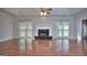 Spacious living room featuring a fireplace, hardwood floors, and plenty of natural light at 2808 Autumn Lake Ln # D/6, Decatur, GA 30034