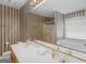 Bathroom with dual sinks, a separate shower, and a tub with jets at 230 Acorn Ct, Mcdonough, GA 30253