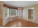 Breakfast nook featuring natural light, chandelier, and access to laundry room at 230 Acorn Ct, Mcdonough, GA 30253