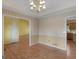 Formal dining room with hardwood flooring and easy access to the kitchen at 230 Acorn Ct, Mcdonough, GA 30253