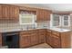 Bright kitchen featuring wood cabinets and modern appliances, offering a functional cooking space at 230 Acorn Ct, Mcdonough, GA 30253