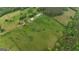 Acreage featuring rolling hills and wooded area at 1761 Reavesville Rd, Bowdon, GA 30108
