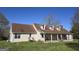 Charming home features a front porch and multiple dormer windows at 1761 Reavesville Rd, Bowdon, GA 30108