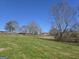 Picturesque land featuring lush greenery and scattered trees, perfect for building or enjoying nature at 1761 Reavesville Rd, Bowdon, GA 30108