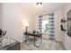 Bright office with neutral walls, gray carpeting, and a bright window at 10414 Trellis Lane (Lot 36), Hampton, GA 30228
