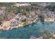Breathtaking aerial view of lakefront property featuring custom homes and private docks at 1190 Plantation Dr, Villa Rica, GA 30180