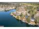 Gorgeous aerial real estate shot featuring waterfront homes and beautiful lake views at 1190 Plantation Dr, Villa Rica, GA 30180