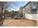 Lakeside home exterior with garage, stairs to the upper level, and lake access at 1190 Plantation Dr, Villa Rica, GA 30180
