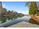 Picturesque lake view with waterfront homes in the background at 1190 Plantation Dr, Villa Rica, GA 30180