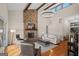 Bright living room showcasing stone fireplace and high ceilings at 1190 Plantation Dr, Villa Rica, GA 30180