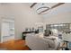 Bright living room with wood floors and a view of the deck and lake beyond at 1190 Plantation Dr, Villa Rica, GA 30180