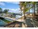 Picturesque marina with multiple boats docked, offering waterfront access and recreational opportunities on a clear day at 1190 Plantation Dr, Villa Rica, GA 30180