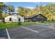 Modern recreation center with ample parking, well-maintained landscaping, and accessible entrance, creating a welcoming space at 1190 Plantation Dr, Villa Rica, GA 30180