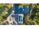 Aerial view of tennis and pickleball courts and adjacent swimming pool at 1190 Plantation Dr, Villa Rica, GA 30180
