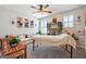 Zen room with a massage table, seating, shuttered window, and neutral decor at 6910 Newcastle Ct, Fairburn, GA 30213