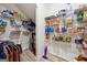 Walk-in pantry with ample shelving and storage space for groceries, household items, and supplies at 6910 Newcastle Ct, Fairburn, GA 30213